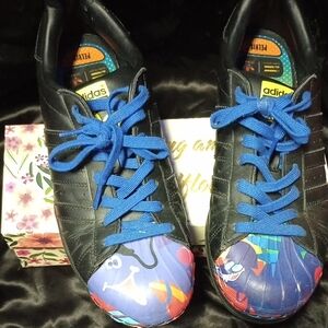 Adidas Women's Black Sneakers with Blue and Red Accents